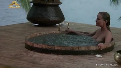 Beautiful Bo Derek showing off her hairy pussy at the beach