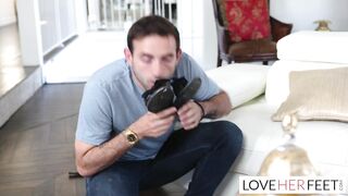 Redhead big titty MILF gives a slippery footjob