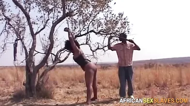 Naughty African Woman Outdoor BDSM Public Whipping For Stealing