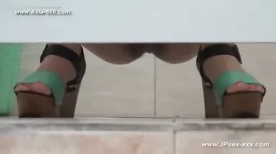 Chinese girl was peeing in front of a hidden camera, not even knowing about it