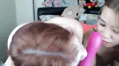 Petite Chinese teens are toying and licking each others pussy in front of a web cam