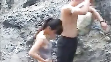 Chinese woman is having her first casual sex session in the nature, in the middle of the day