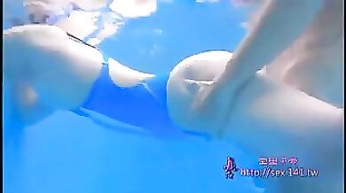 Chinese babe gave a blowjob to her friend while she was in the swimming pool