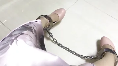 Chinese woman is masturbating while having many restrains on and enjoying every single second of it