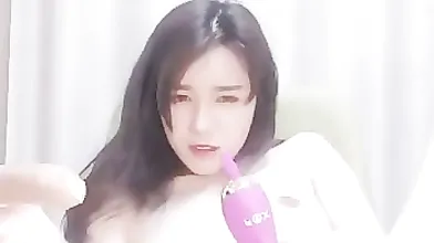 Chinese brunette is often masturbating on cam just because it feels so fucking good, every time