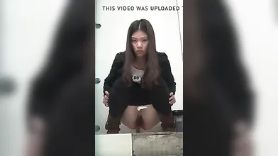 Chinese girls are peeing in a public toilet in front of a hidden camera, all day long